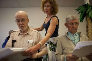 Randy Hoffman working with patients in a voice group